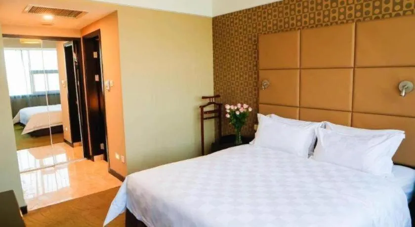 Bed in Zibo Blue Horizon International Hotel