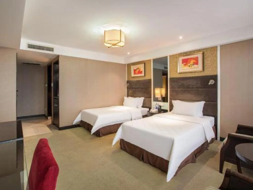 Bed in Zibo Blue Horizon International Hotel