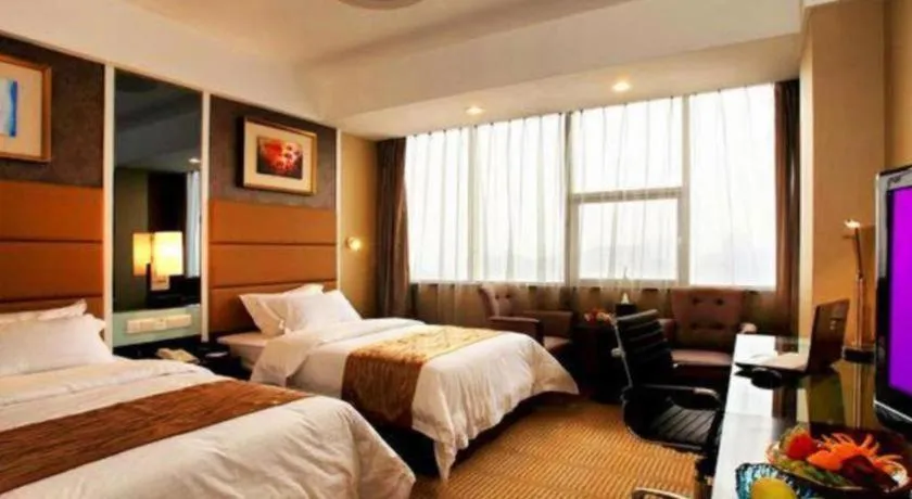 Bed in Zibo Blue Horizon International Hotel