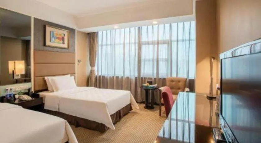 Bed in Zibo Blue Horizon International Hotel