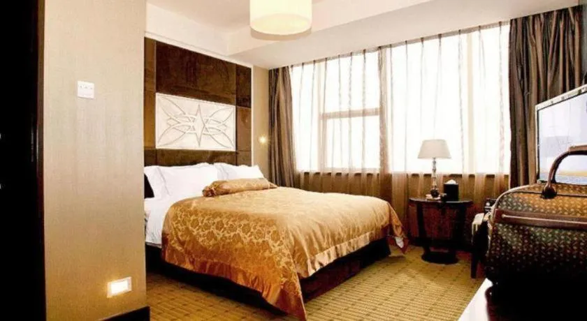 Bed in Zibo Blue Horizon International Hotel