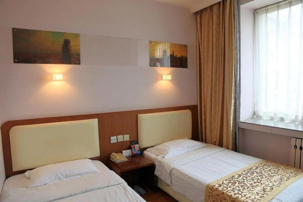 Bed in Super 8 Hotel Beijing International Exhibition Center