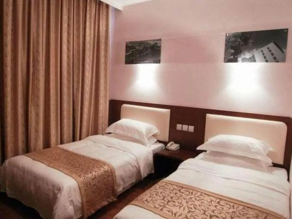 Bed in Super 8 Hotel Beijing International Exhibition Center