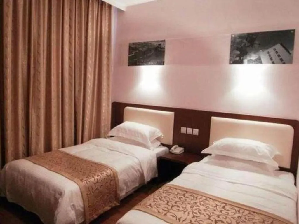 Bed in Super 8 Hotel Beijing International Exhibition Center