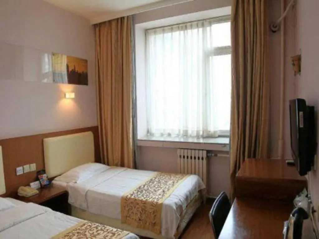 Bed in Super 8 Hotel Beijing International Exhibition Center