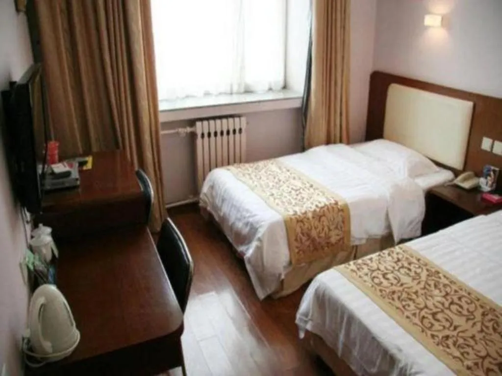 Bed in Super 8 Hotel Beijing International Exhibition Center