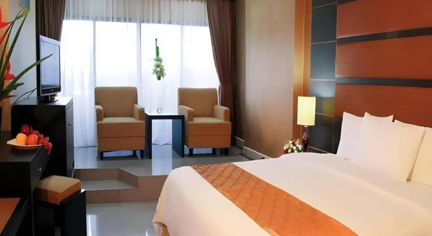 Bed in Danau Toba Hotel International
