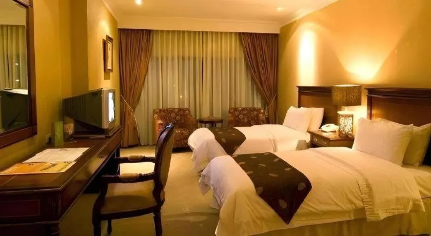 Bed in Danau Toba Hotel International
