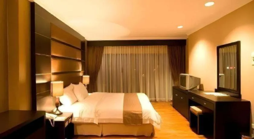 Bed in Danau Toba Hotel International