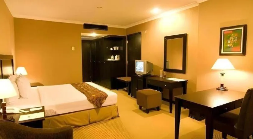 Bed in Danau Toba Hotel International