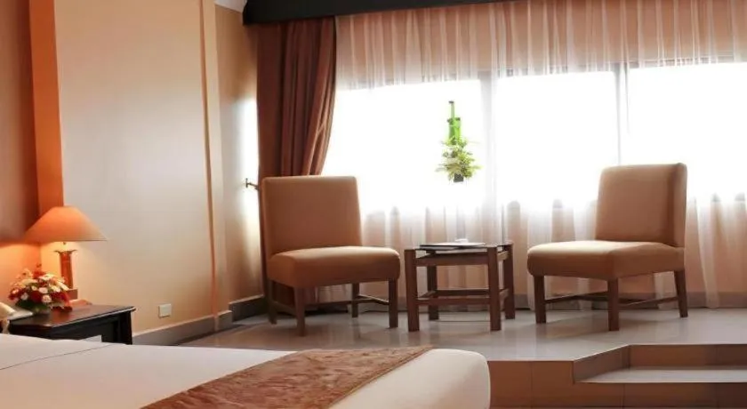 Bed in Danau Toba Hotel International