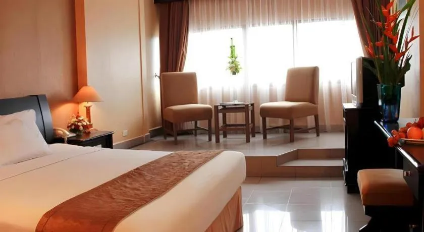 Bed in Danau Toba Hotel International