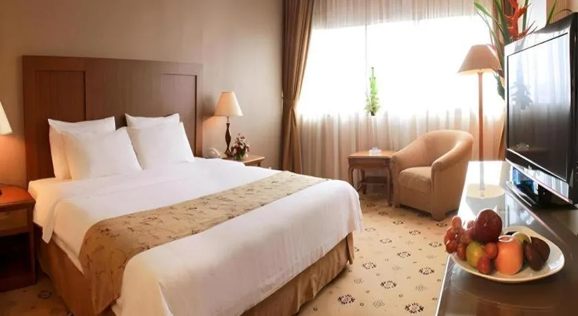 Bed in Danau Toba Hotel International