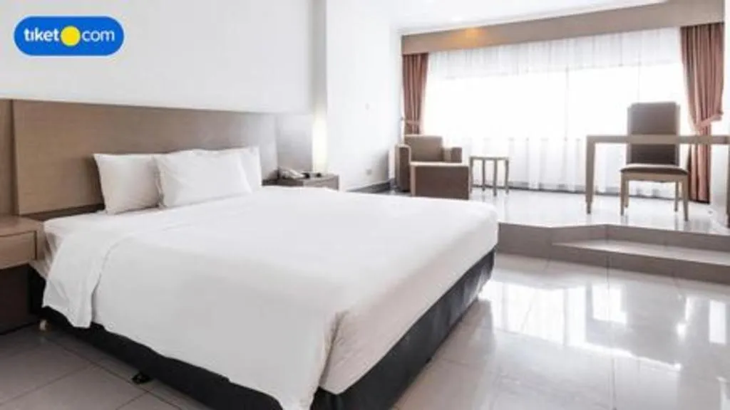 Bed in Danau Toba Hotel International