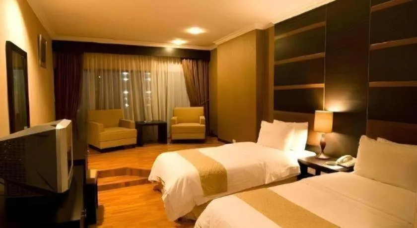 Bed in Danau Toba Hotel International