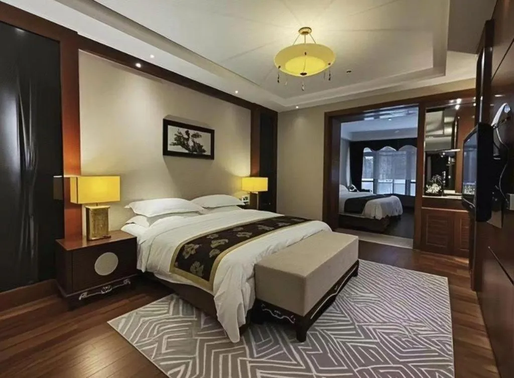 Bed in Jinggangshan ZhongTaiLai International Hotel