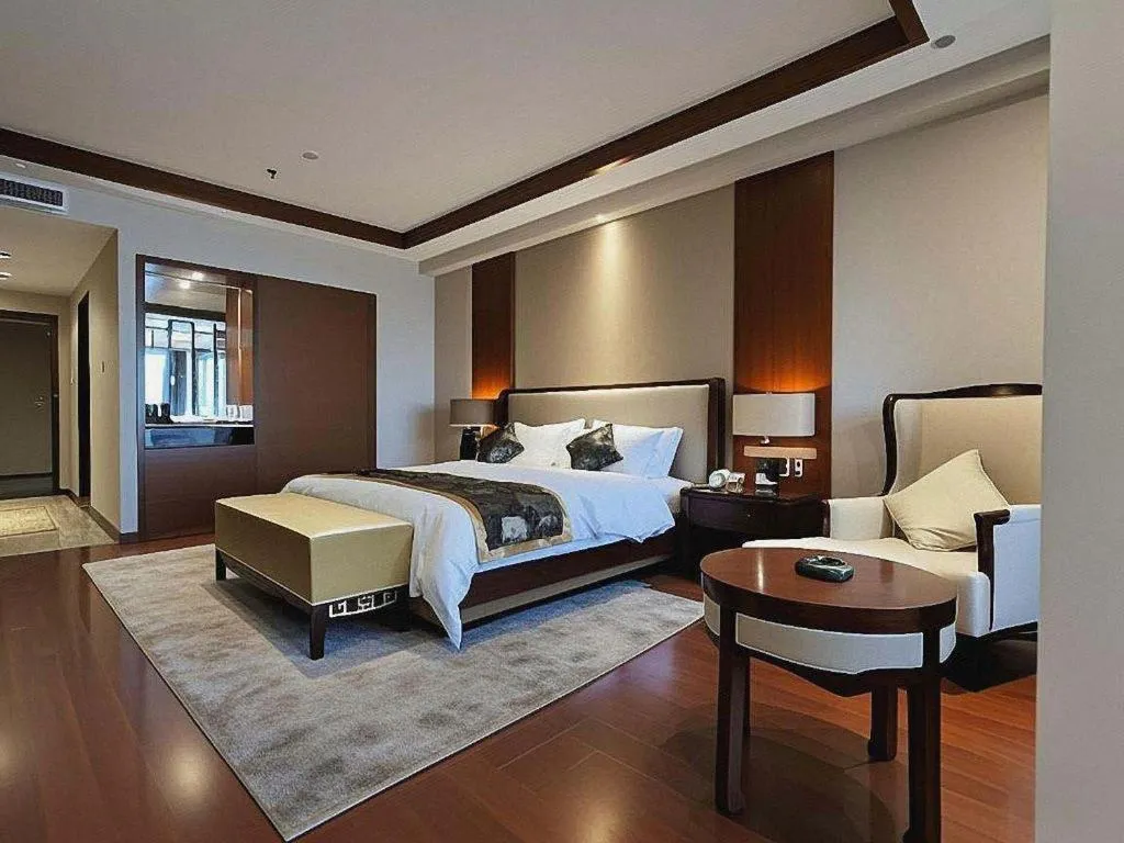 Bed in Jinggangshan ZhongTaiLai International Hotel