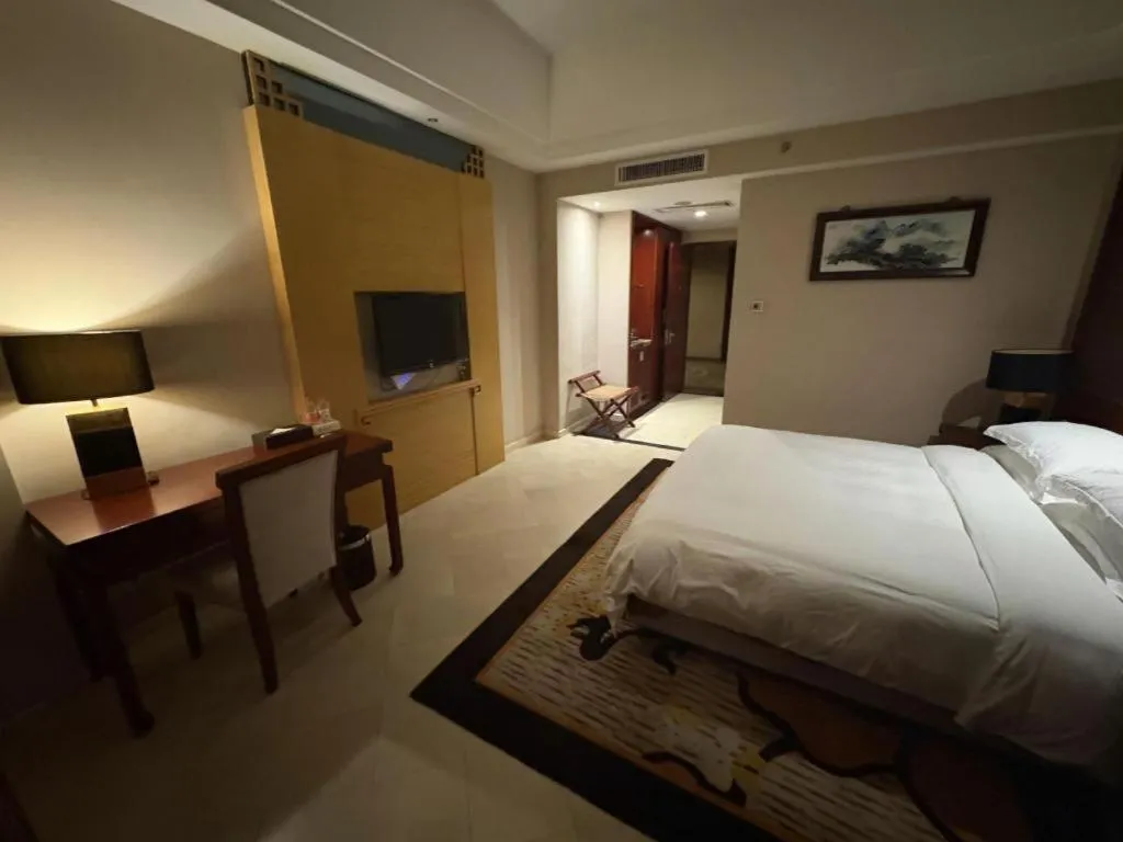 Bed in Jinggangshan ZhongTaiLai International Hotel