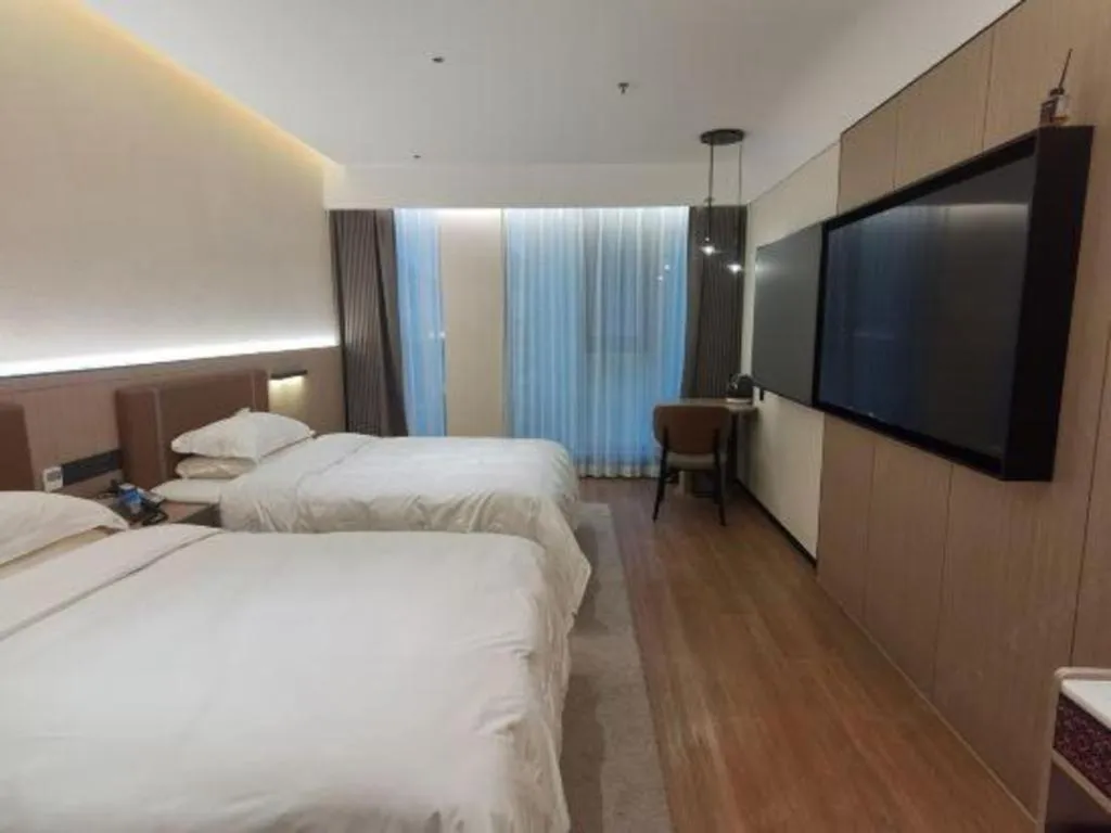 Bed in Jinggangshan ZhongTaiLai International Hotel