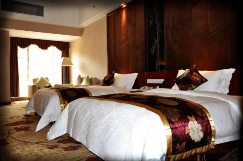 Bed in Jinggangshan ZhongTaiLai International Hotel