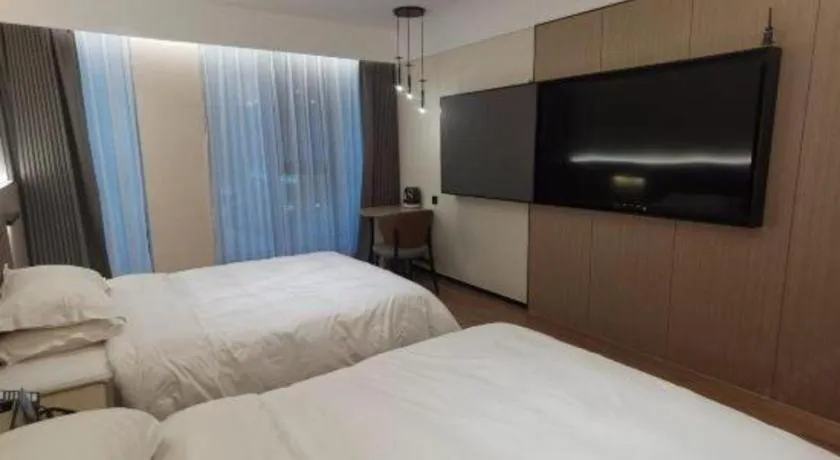 Bed in Jinggangshan ZhongTaiLai International Hotel