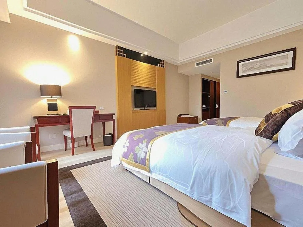 Bed in Jinggangshan ZhongTaiLai International Hotel