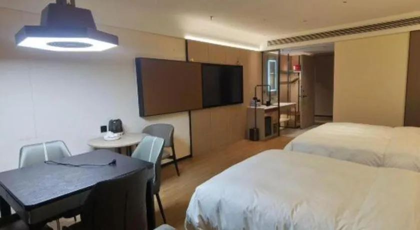 Bed in Jinggangshan ZhongTaiLai International Hotel