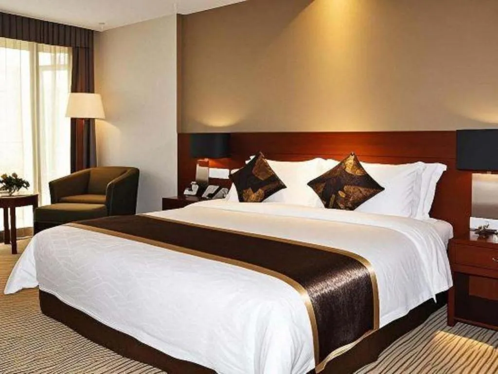 Bed in Jinggangshan ZhongTaiLai International Hotel