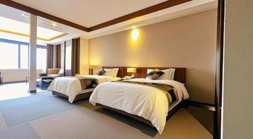 Bed in Jinggangshan ZhongTaiLai International Hotel