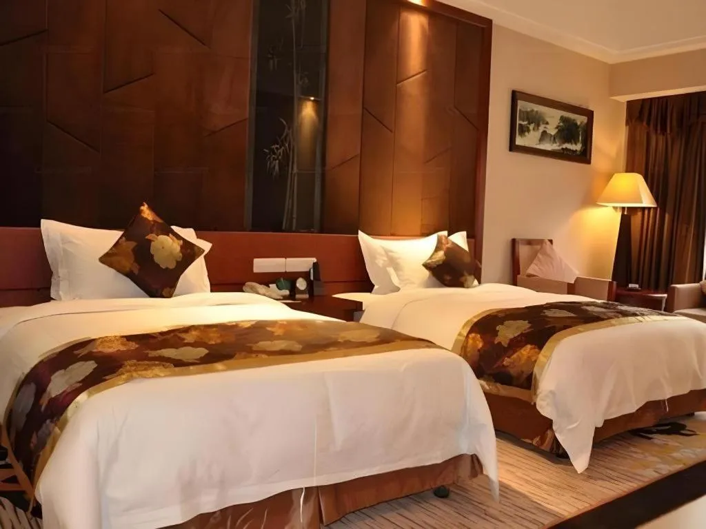 Bed in Jinggangshan ZhongTaiLai International Hotel