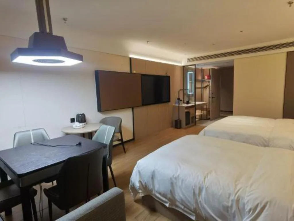 Bed in Jinggangshan ZhongTaiLai International Hotel