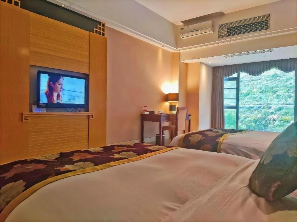 Bed in Jinggangshan ZhongTaiLai International Hotel