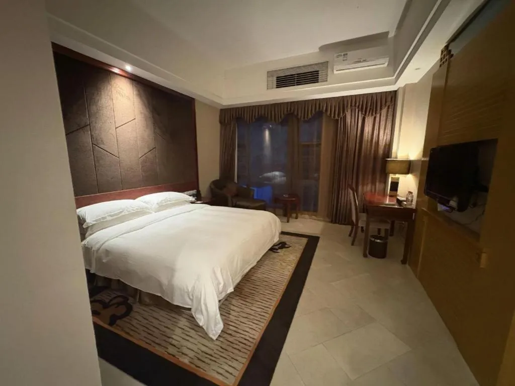 Bed in Jinggangshan ZhongTaiLai International Hotel