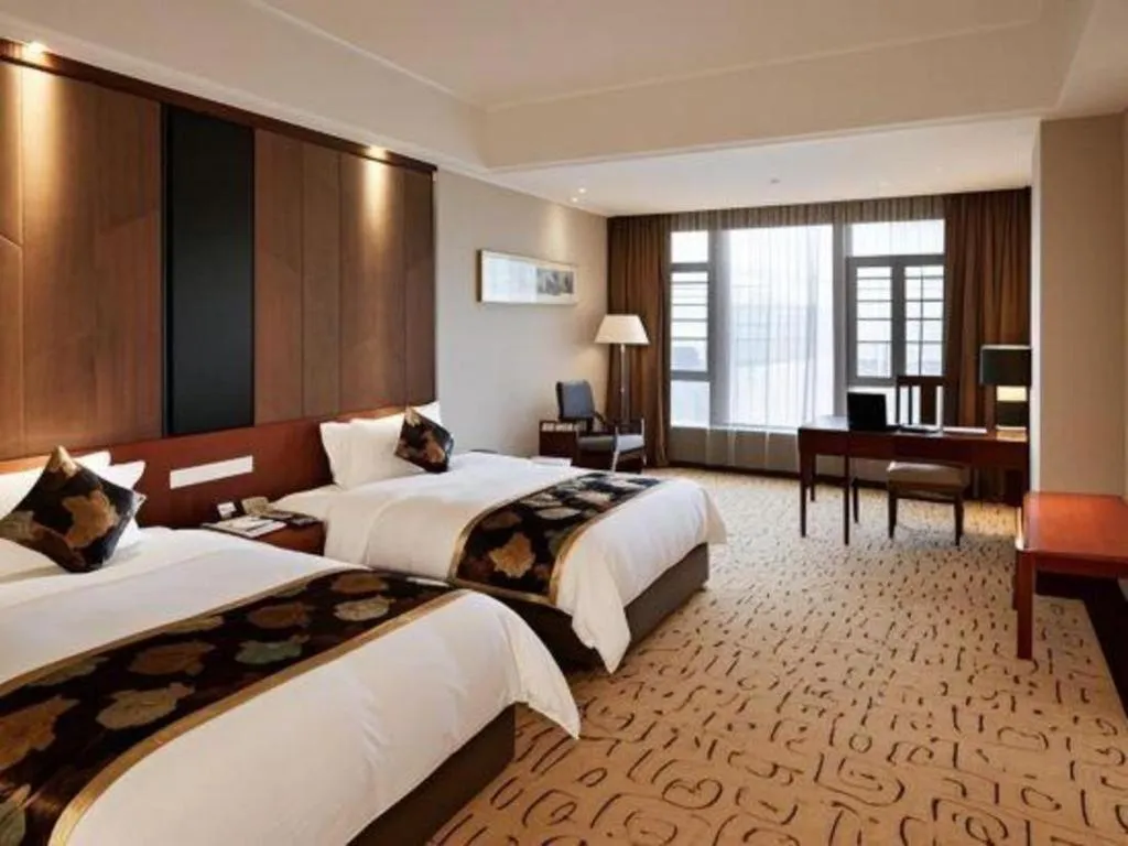 Bed in Jinggangshan ZhongTaiLai International Hotel