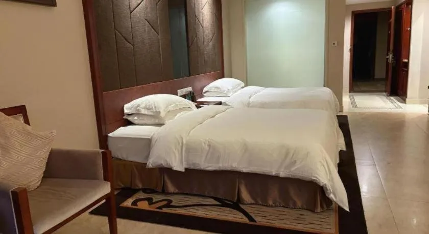 Bed in Jinggangshan ZhongTaiLai International Hotel
