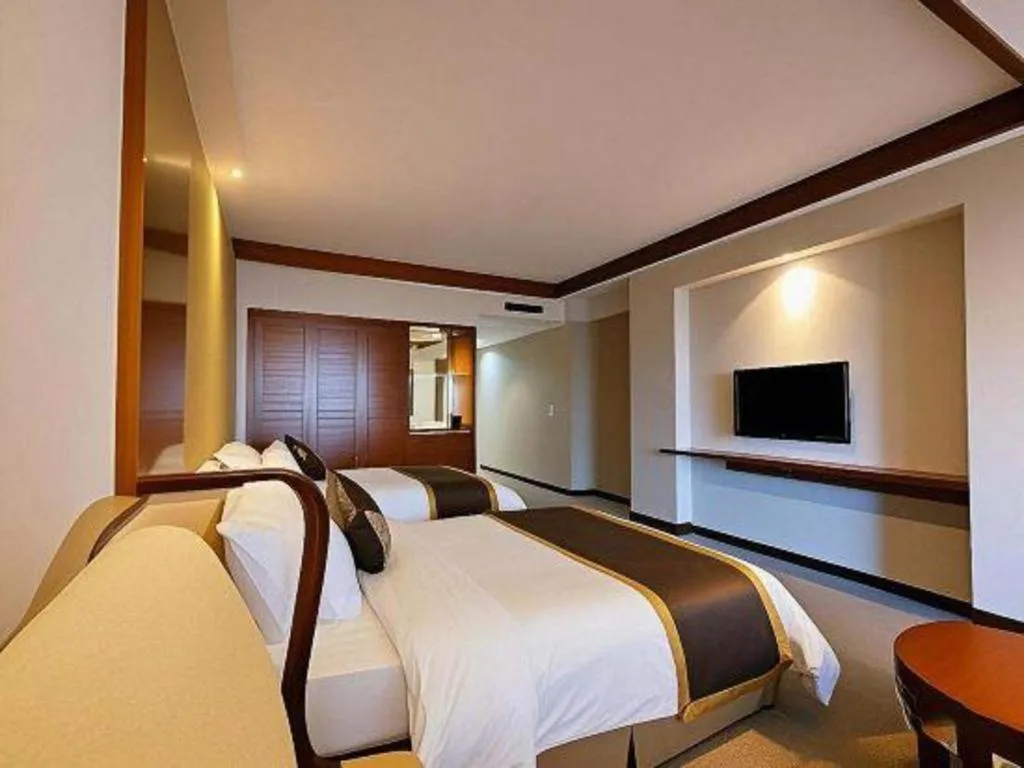 Bed in Jinggangshan ZhongTaiLai International Hotel