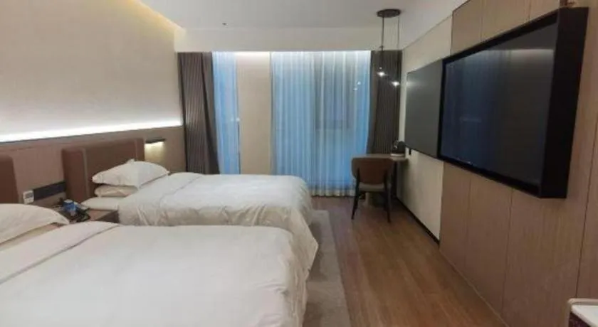 Bed in Jinggangshan ZhongTaiLai International Hotel