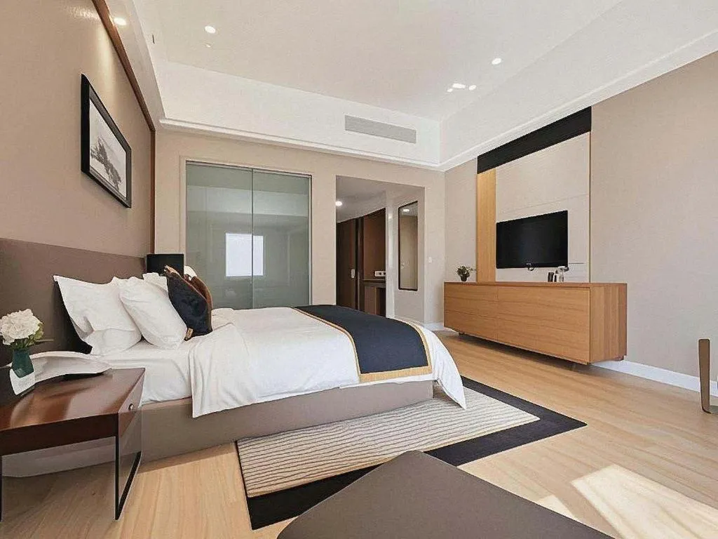 Bed in Jinggangshan ZhongTaiLai International Hotel