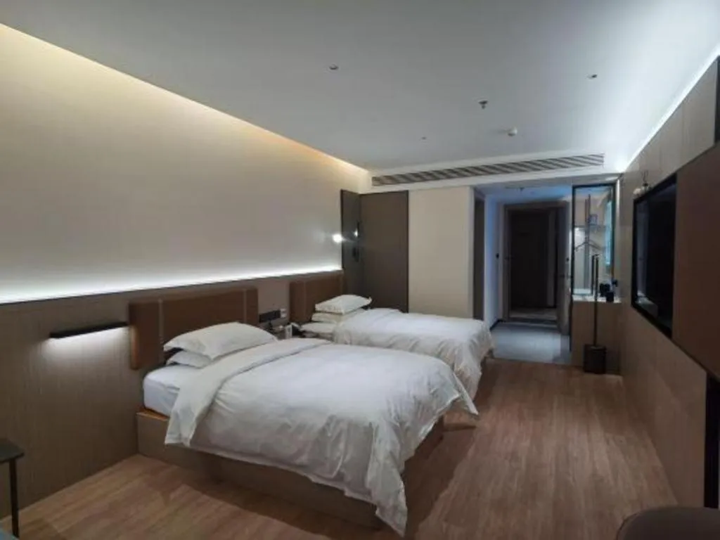 Bed in Jinggangshan ZhongTaiLai International Hotel