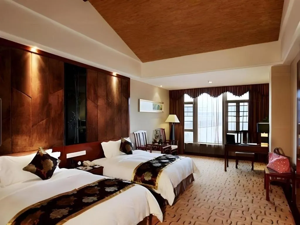 Bed in Jinggangshan ZhongTaiLai International Hotel