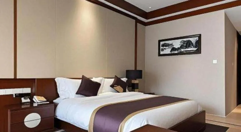 Bed in Jinggangshan ZhongTaiLai International Hotel