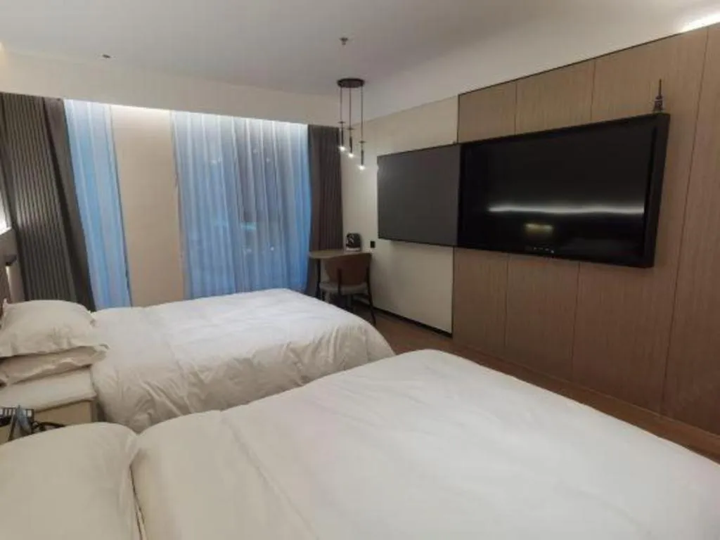 Bed in Jinggangshan ZhongTaiLai International Hotel