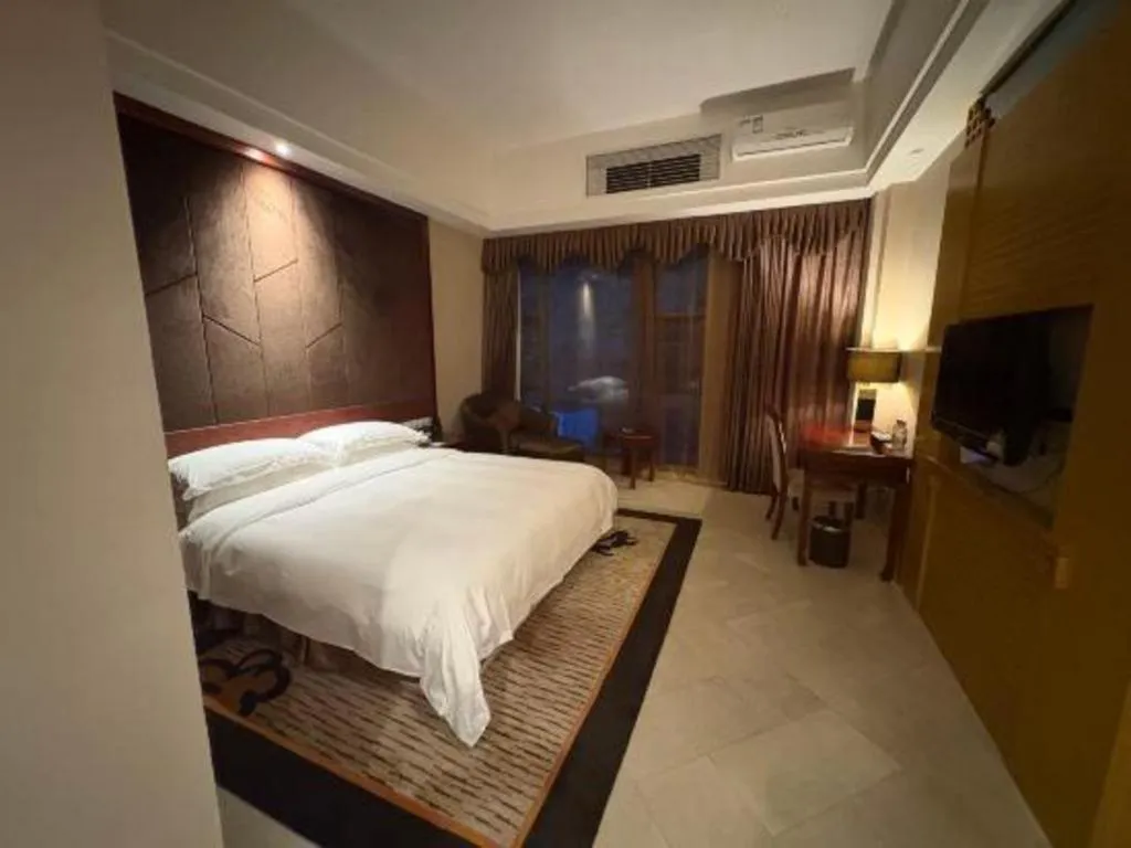 Bed in Jinggangshan ZhongTaiLai International Hotel