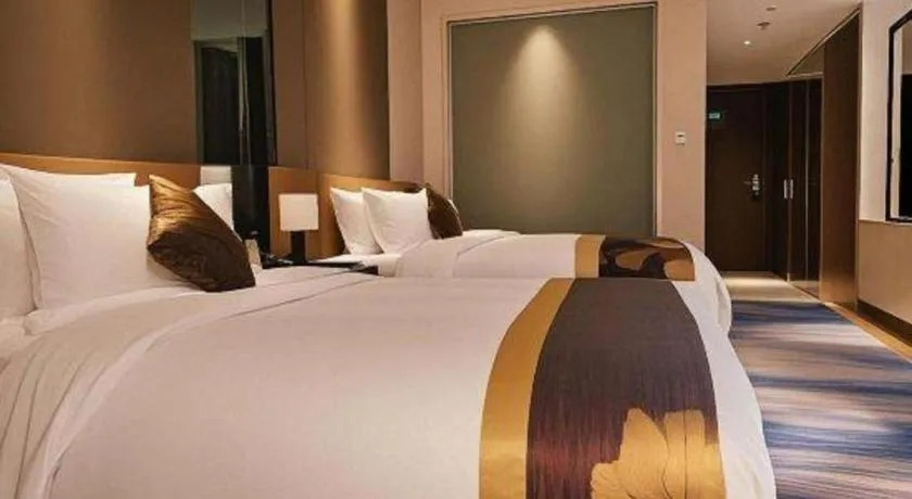 Bed in Jinggangshan ZhongTaiLai International Hotel