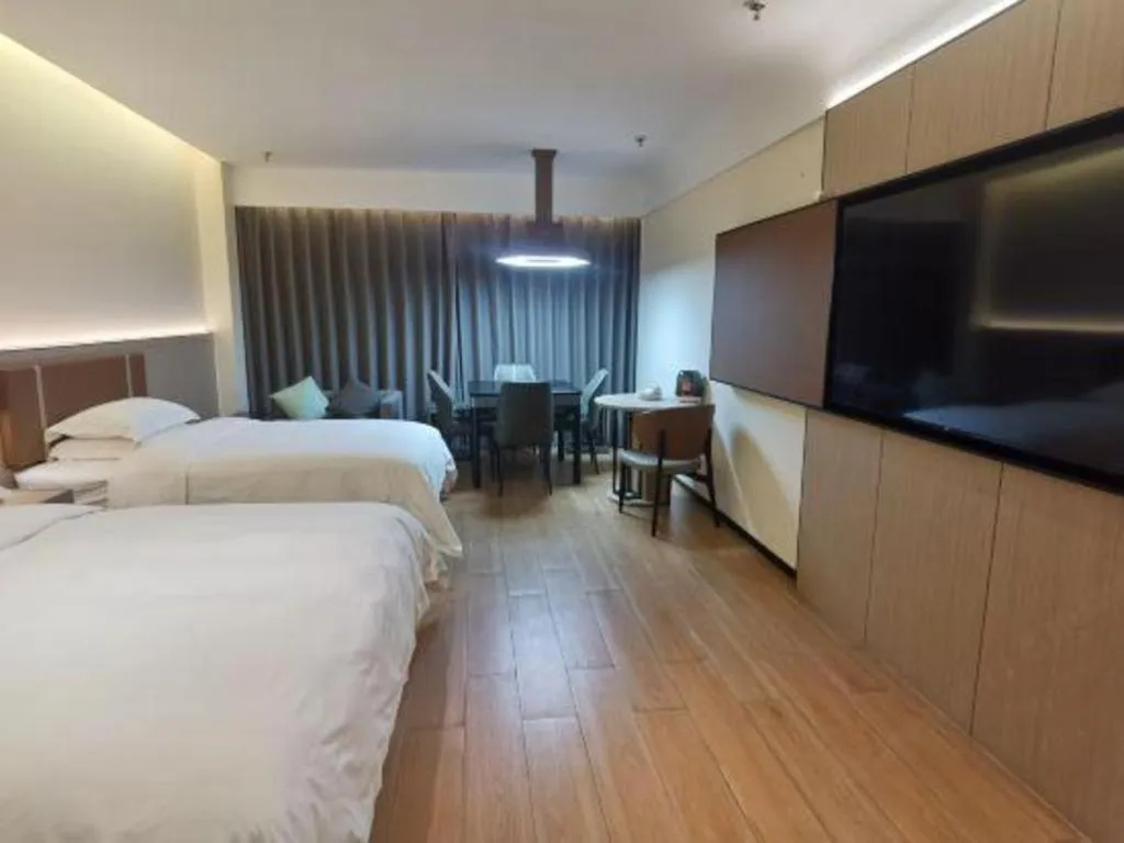 Bed in Jinggangshan ZhongTaiLai International Hotel