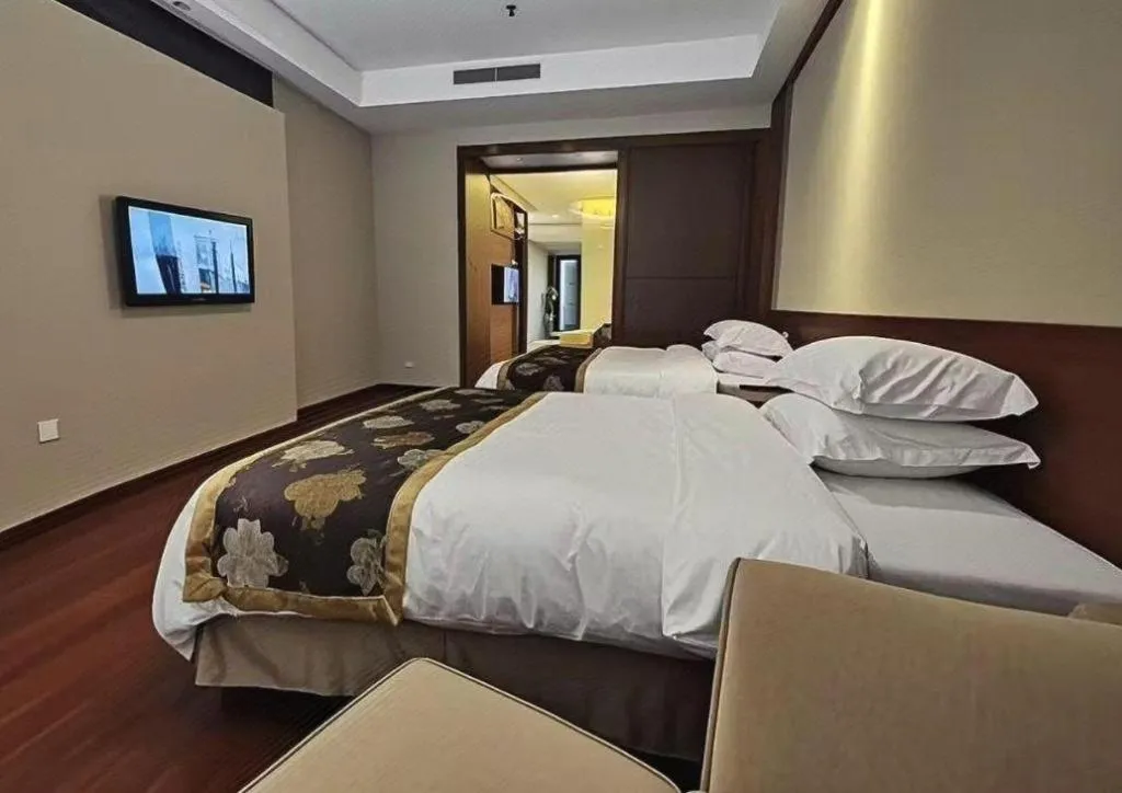 Bed in Jinggangshan ZhongTaiLai International Hotel