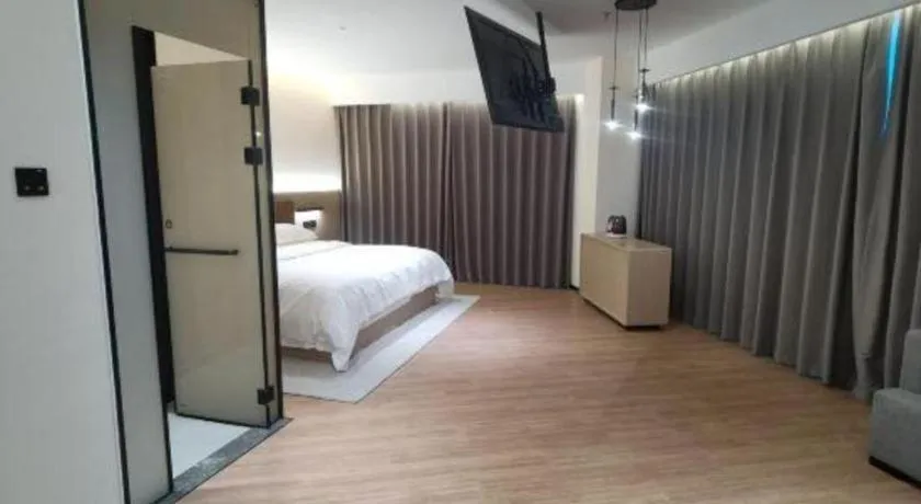 Bed in Jinggangshan ZhongTaiLai International Hotel