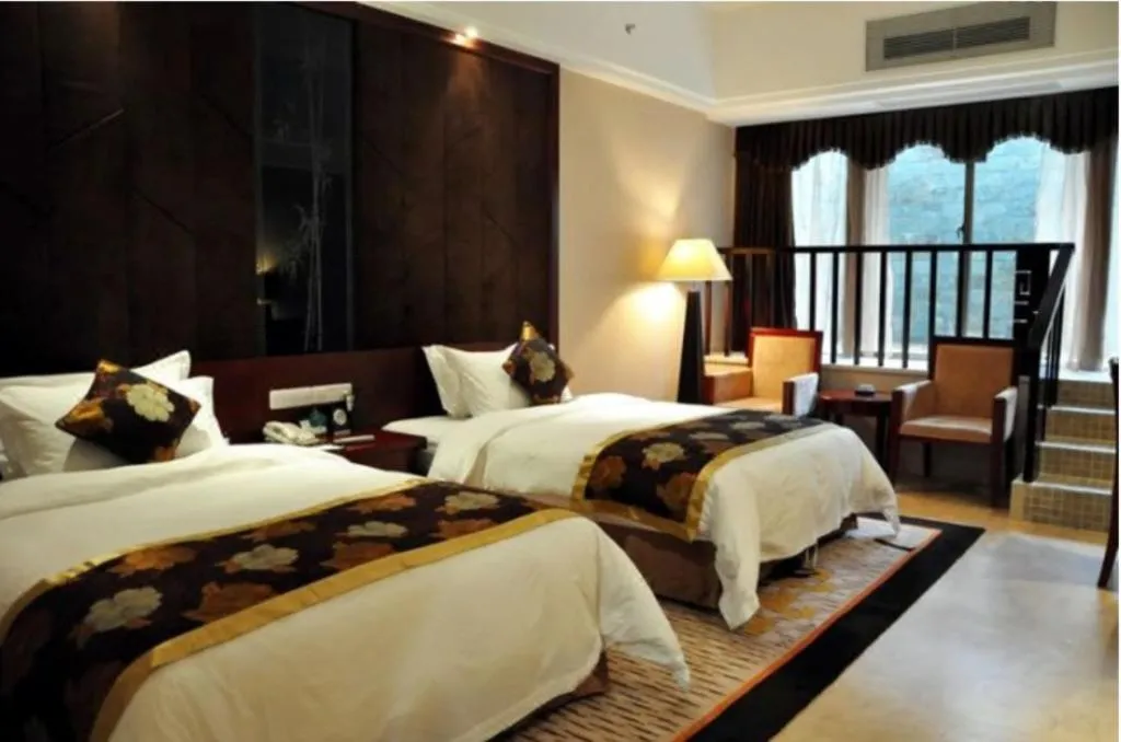 Bed in Jinggangshan ZhongTaiLai International Hotel