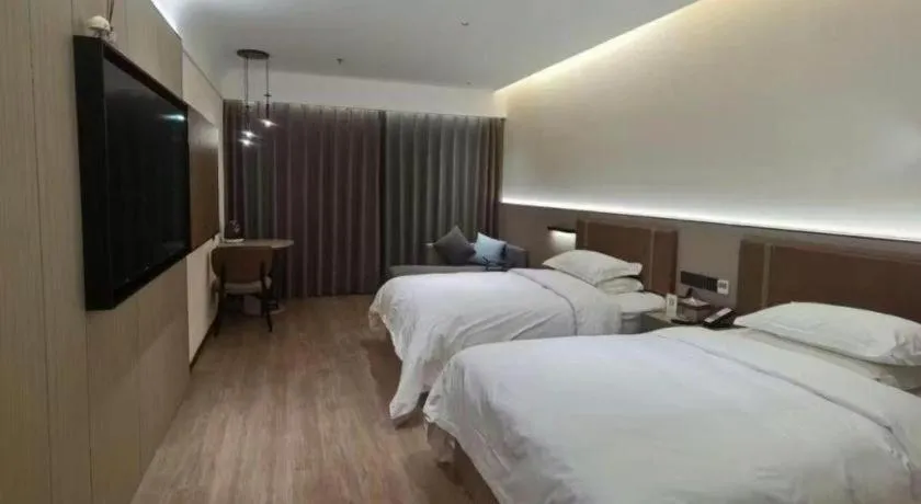 Bed in Jinggangshan ZhongTaiLai International Hotel