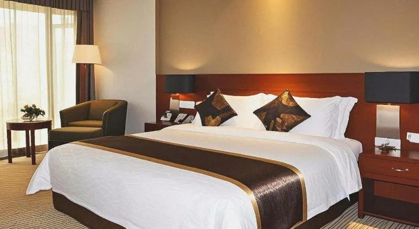Bed in Jinggangshan ZhongTaiLai International Hotel